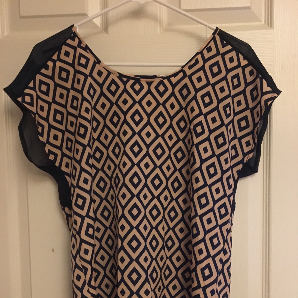 Pink and blue patterned blouse